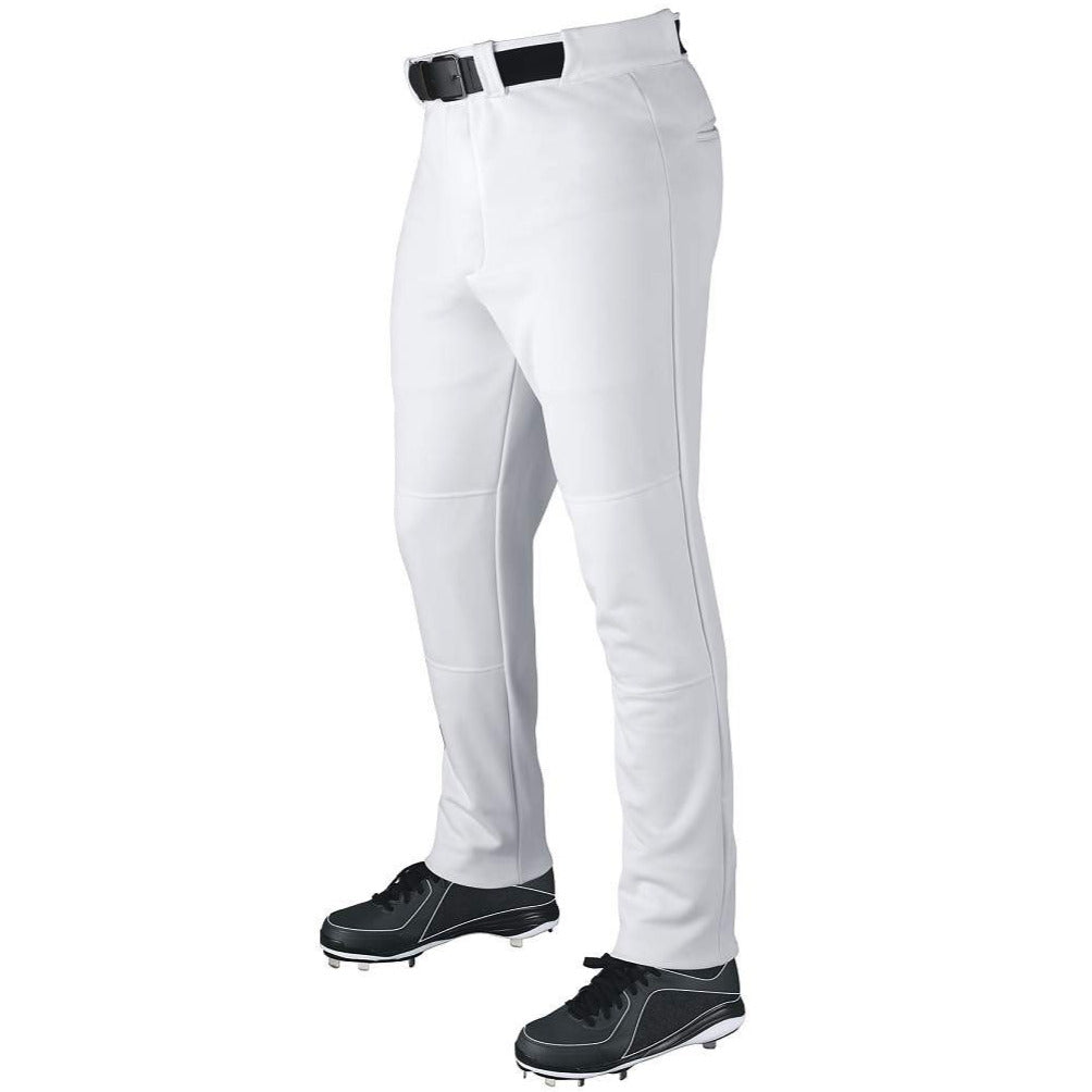 A person wears DeMarini Youth VIP Baseball Pants (WTD2079) in moisture-wicking white with an adjustable inseam, styled with a black belt and black cleats, standing against a plain white background.